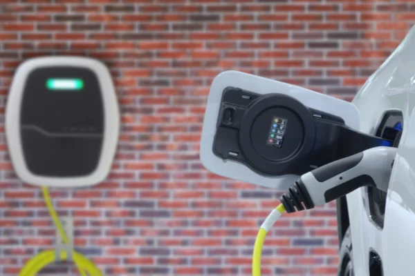 An EV charger point connected to a car